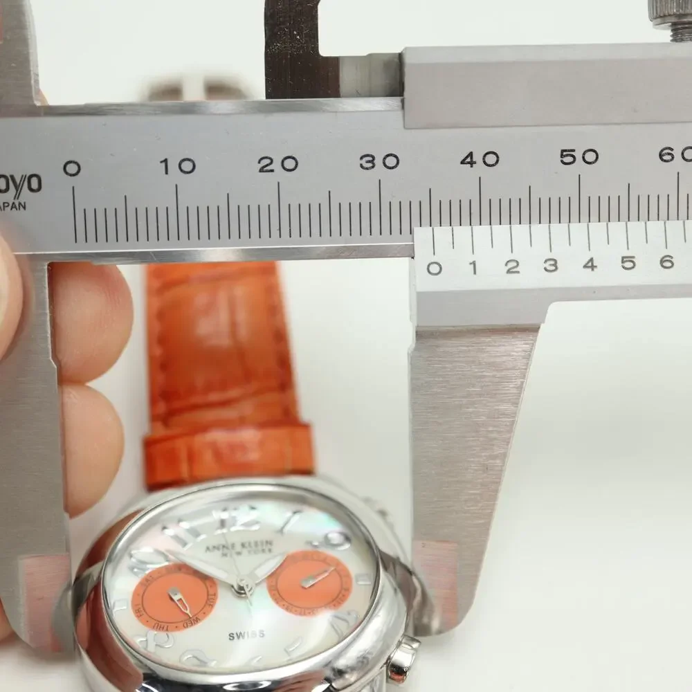 Anne Klein Swiss Oval Orange MOP 35mm Womens Watch Day Date Leather New Battery